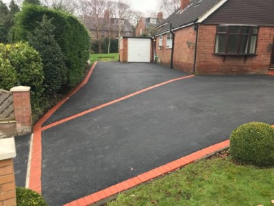 Large Tarmac Driveway Split Using Red Bricks